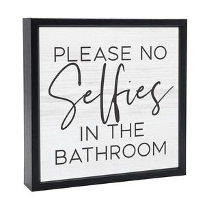 Please no selfies in the bathroom sign